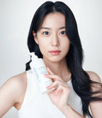 Model using Age Defying Essence Forte in daily routine