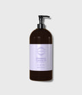 Drainagetox Treatment Oil 1000ml 深棕色泵头瓶正面，标签印 Soft Body Massage Oil