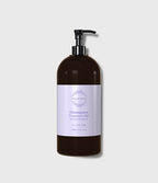 Drainagetox Treatment Oil 1000ml 深棕色泵头瓶正面，标签印 Soft Body Massage Oil