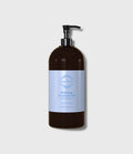 Relaxing Treatment Oil 1000ml 深棕色泵头瓶正面，标签印 Soft Body Massage Oil