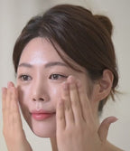 Brief video of a woman gently pressing the anti-aging, microneedling Spicule Regentox serum onto the skin to absorb.